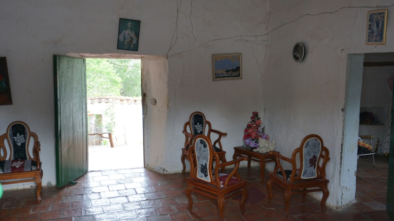 living room with Jesus and Mary, colonial style