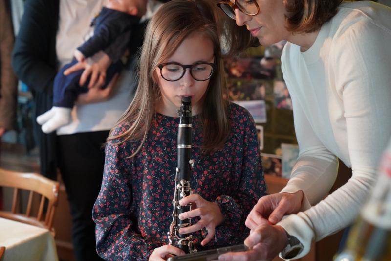 Ava, playing Happy Birthday on  her clarinet