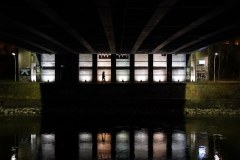at night under the bridge