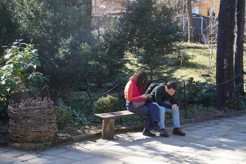 Social scientists watching Tic-Toc videos in front of Boyana Church