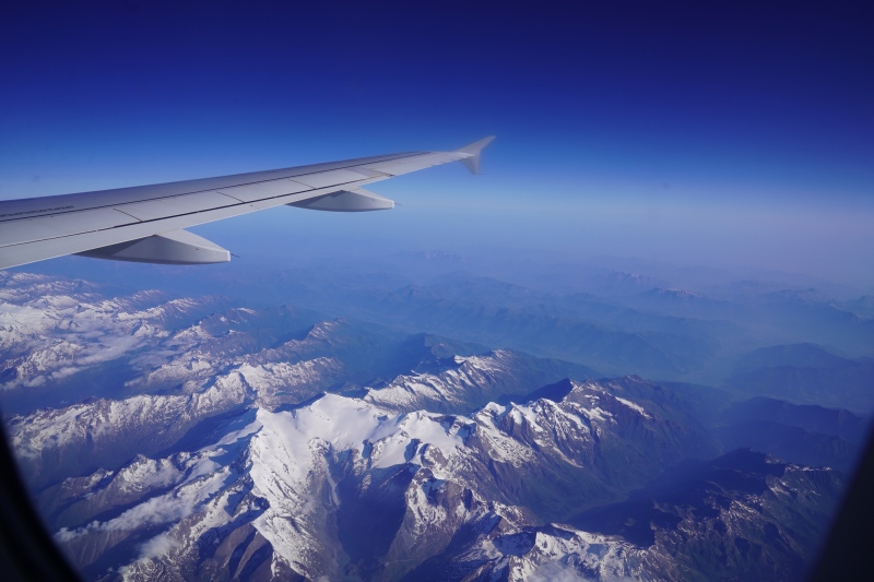 On our way to Madrid over snowy Alp crests