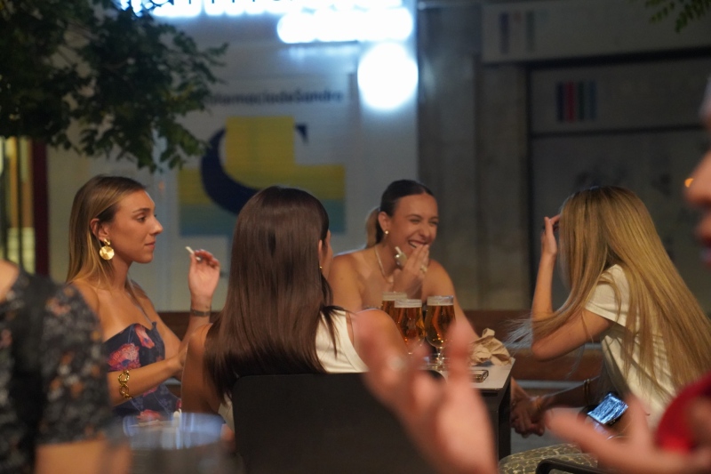 young ladies engaged in a scholarly dispute