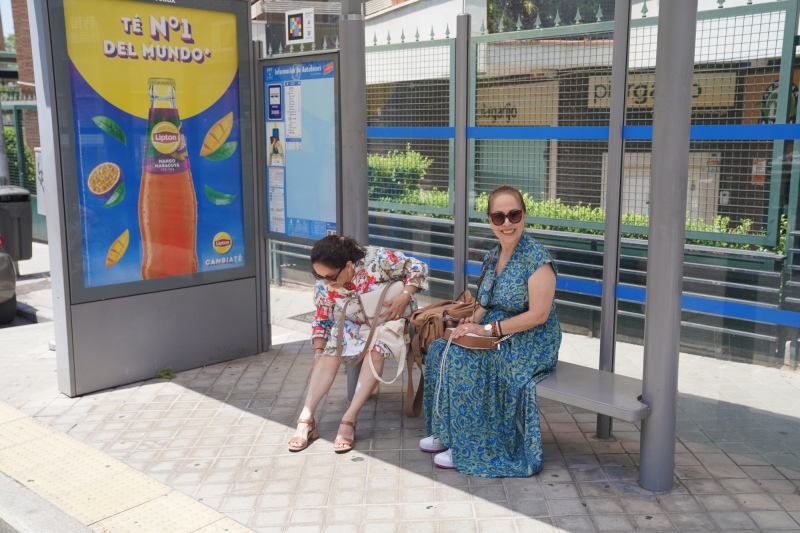 ladies waiting for the bus
