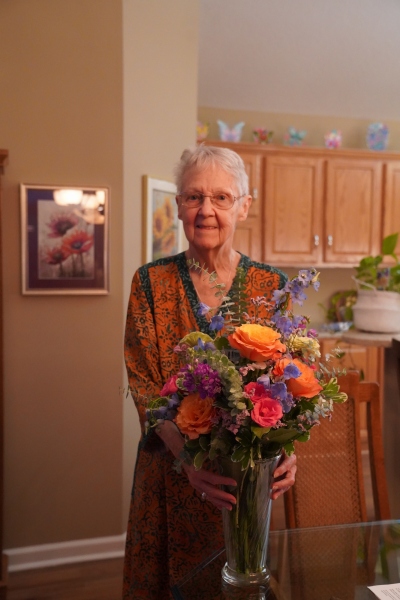 Janice at home with flowers, sent by Vernons ´kids´