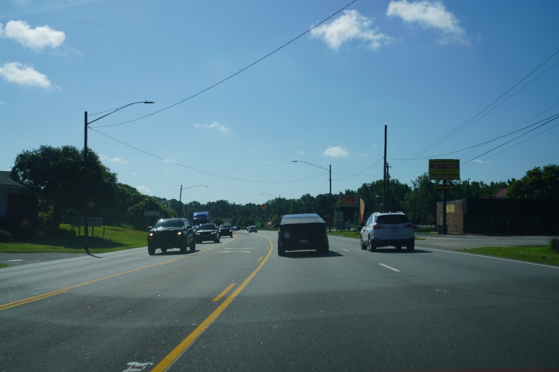 Tesla Cybertruck ahead
